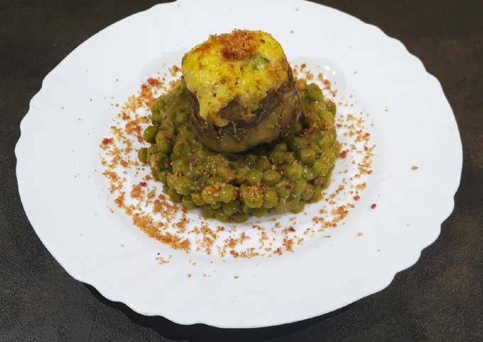 Carciofi con piselli pane e guanciale croccante