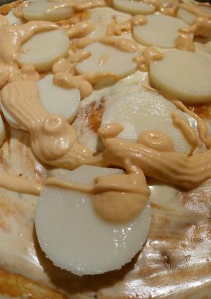 Una foto de Pizza de palmitos con gustito ahumado