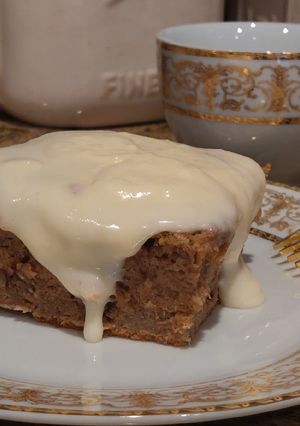 A picture of Banana Nut Cake With Cream Cheese Frosting.