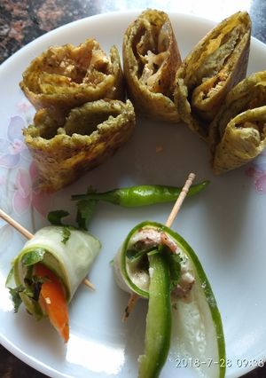A picture of Cucumber rolls with dal cheela rolls.