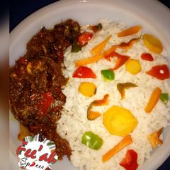 White rice wv peppered sauce A picture of White rice wv peppered sauce.