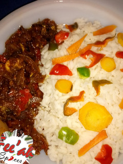 A picture of White rice wv peppered sauce.