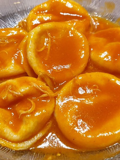 Una foto de Sorrentinos de jamón y muzzarella con salsa de pomodoro