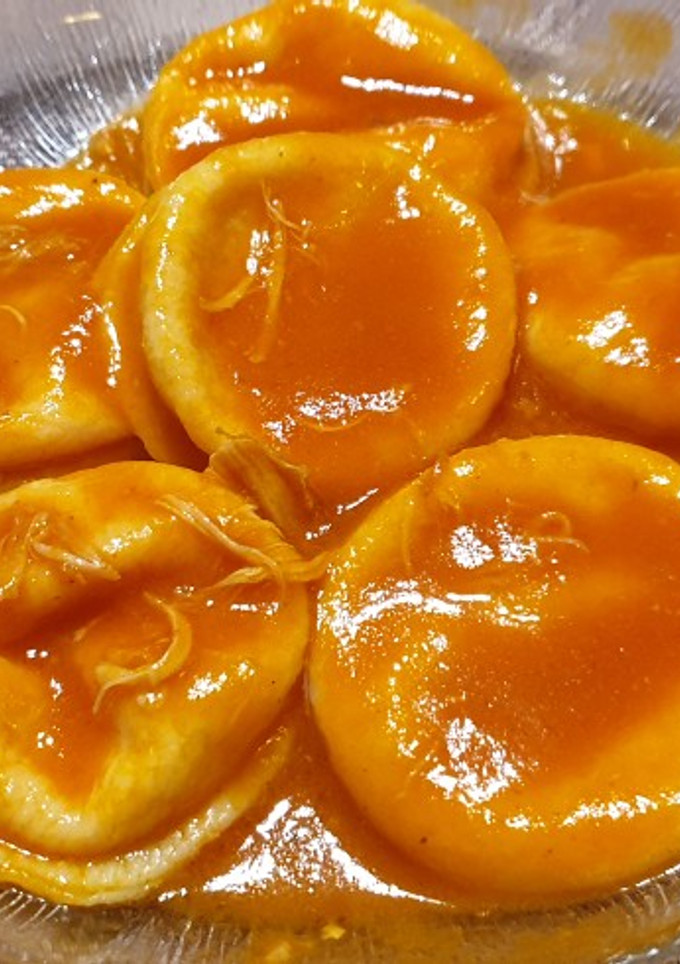 Una foto de Sorrentinos de jamón y muzzarella con salsa de pomodoro
