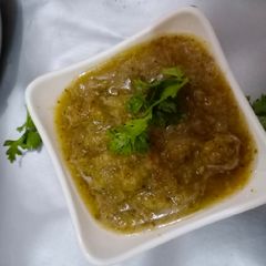 A picture of Tamarind and mint chutney.