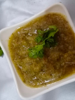A picture of Tamarind and mint chutney.
