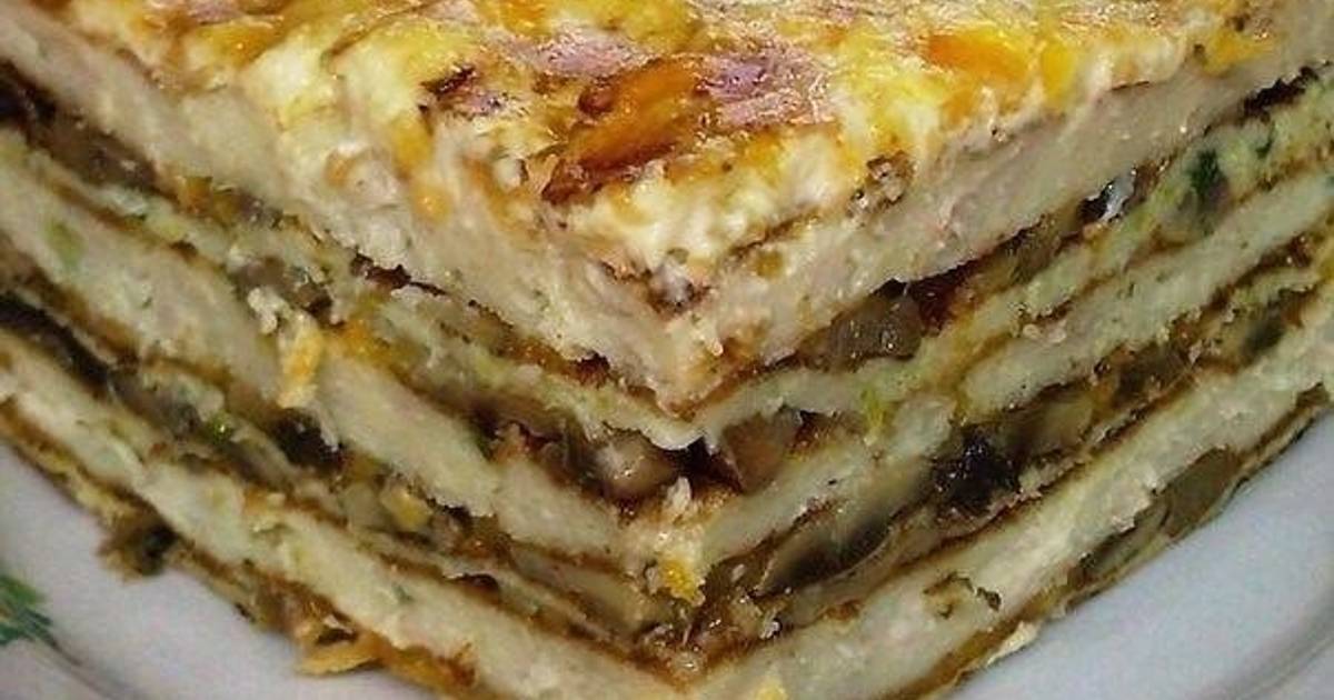 Закусочный торт с фаршем и грибами