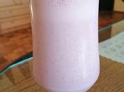 A picture of milkshake with ice cream