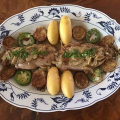 A picture of California Farm Duck Breast with green peppercorn cream.