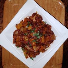A picture of Pumpkin sabzi 🍅🧅🧄🌿.