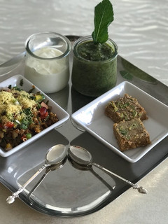 A picture of Vagharelo Rotla (curried pearl millet roti).