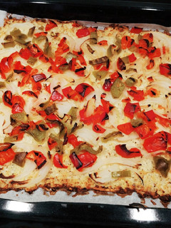 Una foto de Pizza con base de coliflor