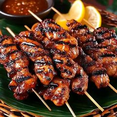A picture of Grilled Chicken Skewers with Sweet Soy Glaze.
