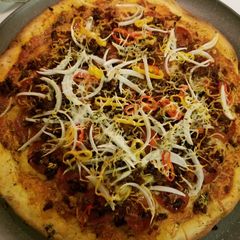 A picture of Chorizo and pepperoni pizza.