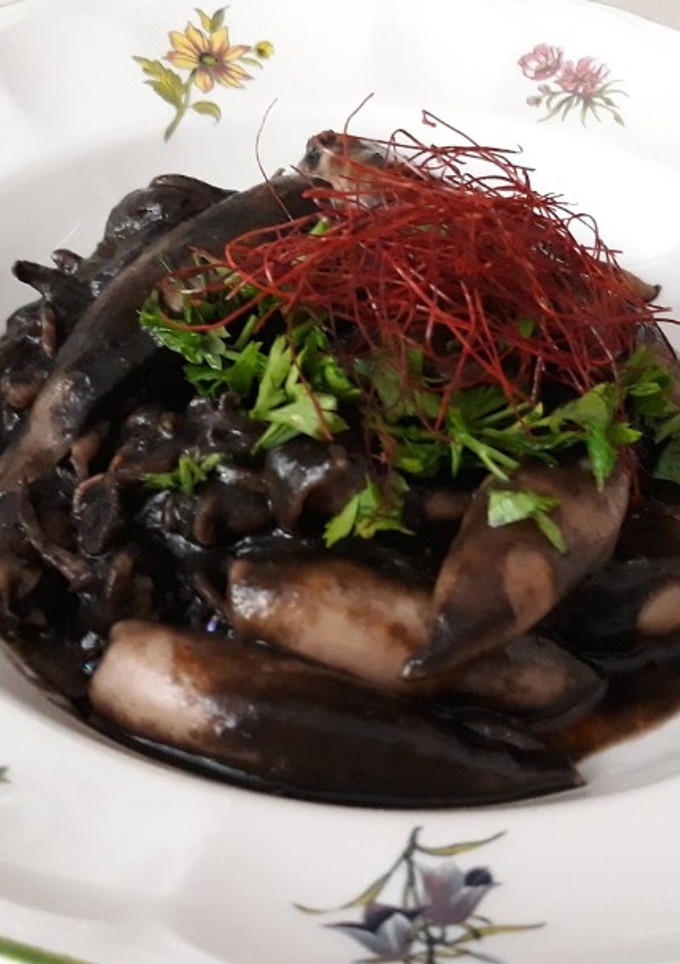 Una foto de Calamares en su tinta