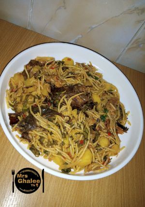 A picture of Sphageti with irish and fish.