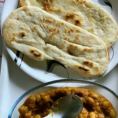 A picture of Pindi chana with naan.