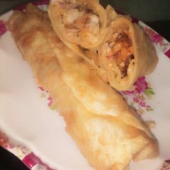 A picture of Chicken tikka roll.
