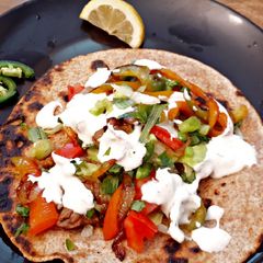 A picture of Scrumptious steak fajitas.