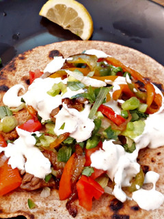 A picture of Scrumptious steak fajitas.