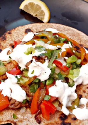 A picture of Scrumptious steak fajitas.