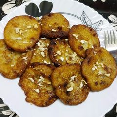 A picture of Banana Coconut Malpua or Pancake.