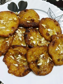 A picture of Banana Coconut Malpua or Pancake.