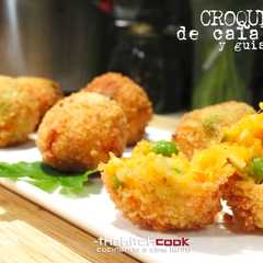 Una foto de Croquetas de calabaza y guisantes