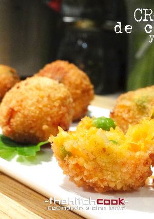 Una foto de Croquetas de calabaza y guisantes