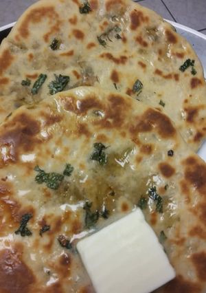 A picture of Baked Aloo Naan.