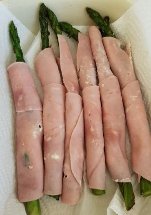A picture of My Asparagus Wrapped in soft cheese and Ham.