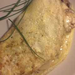 A picture of Omelette diet de champiñon, cebolla y queso.