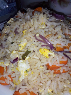 A picture of Soyayyar shinkafa sa kwai.