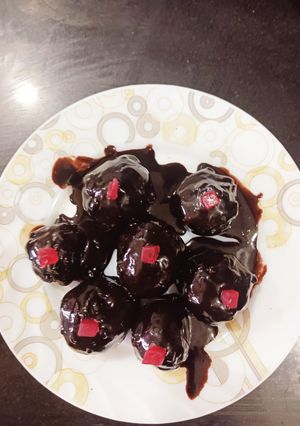 A picture of Stuffed Dates in ganache.