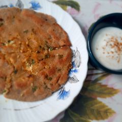 A picture of Stuffed paneer paratha with barley flour.