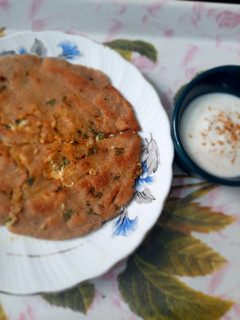 A picture of Stuffed paneer paratha with barley flour.