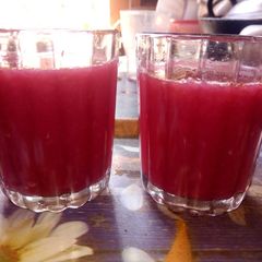 A picture of Orange pomegranate juice.