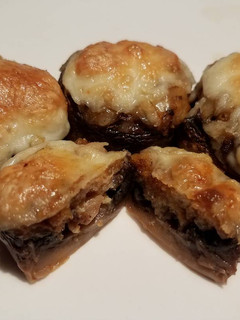 A picture of Keto Cheesy Stuffed Mushrooms.