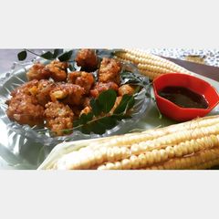 A picture of Corn fritters Bhutte ke pakode.