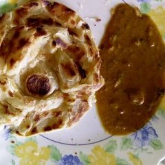 A picture of Ring parota with plain chalna.