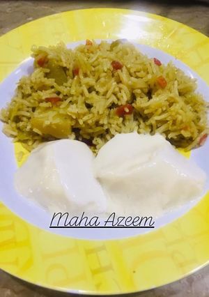A picture of Vegetable rice with homemade yogurt.