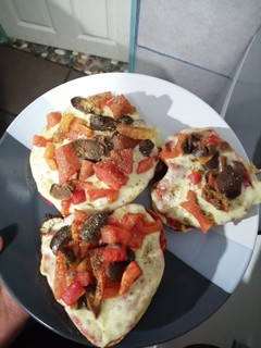 Una foto de Pizzetas en hallullas
