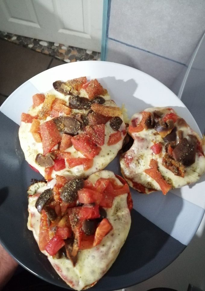 Una foto de Pizzetas en hallullas