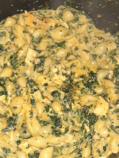 A picture of Cheesy Chicken mac with spinach.