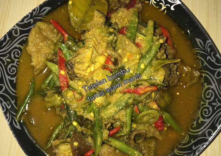 Proses Menyiapkan Tetelan bumbu tumis asam manis Lezat