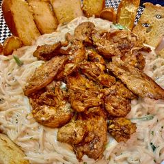 A picture of Pan seared Coffee Chicken with Alfredo Pasta.
