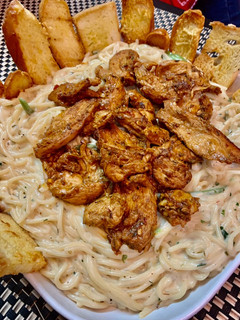 A picture of Pan seared Coffee Chicken with Alfredo Pasta.