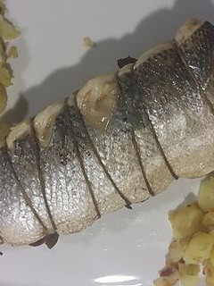 Una foto de Lubina rellena de champiñones