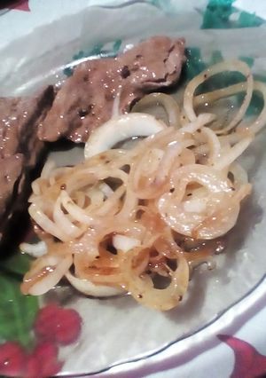 Una foto de Arrachera encebollada