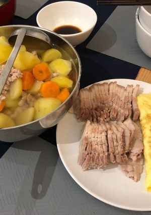 A picture of Dinner: Boiled Pork. Fried Eggs. Carrot, Potato, and Ground Pork Soup.